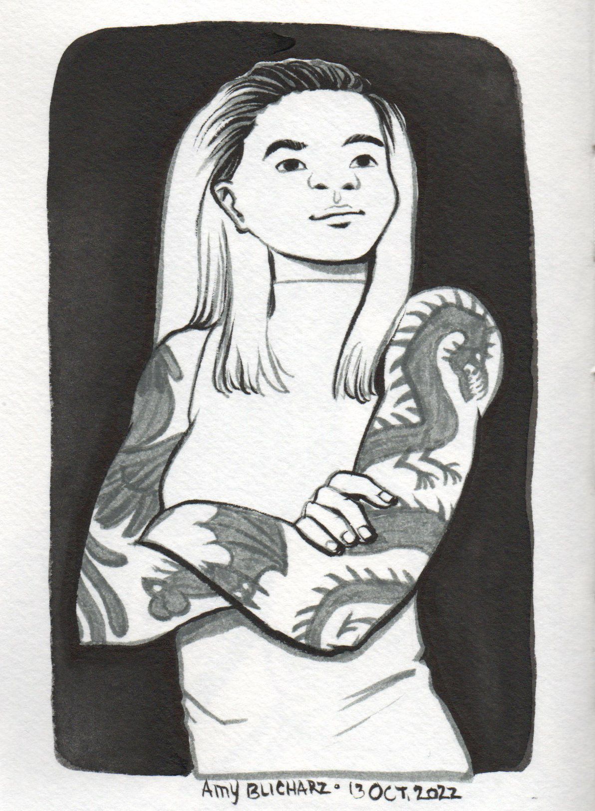 A young woman with tattoos of a dragon, phoenix, mouse, and bat