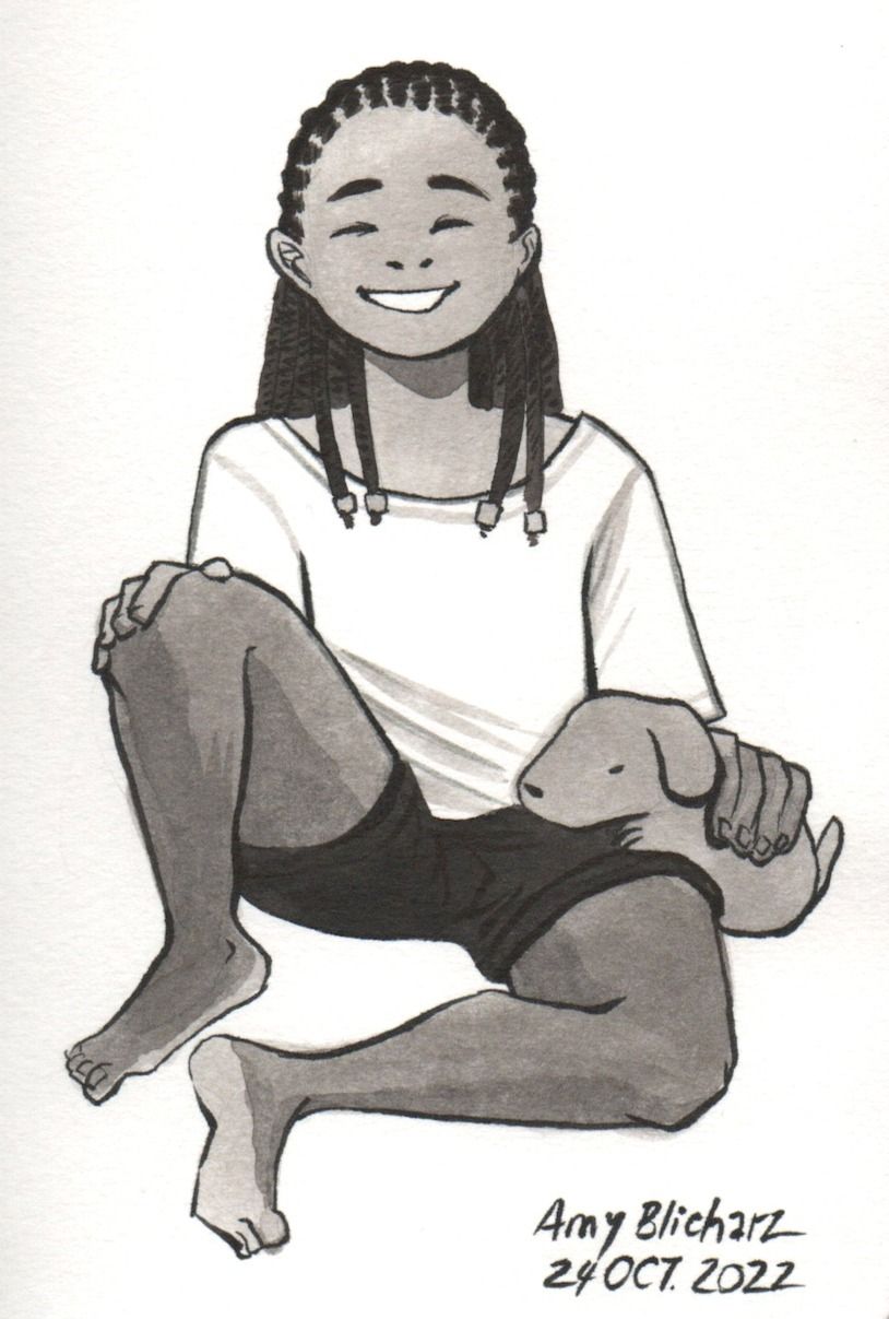 A young black girl with cornrows smiles at the viewer while petting a puppy